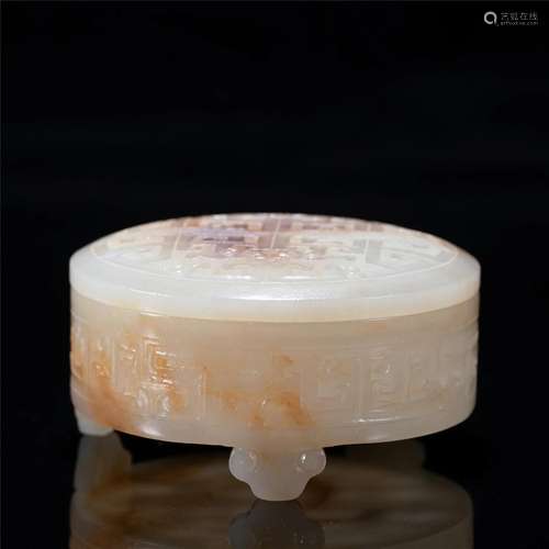 A CHINESE CARVED WHITE JADE CIRCULAR BOX