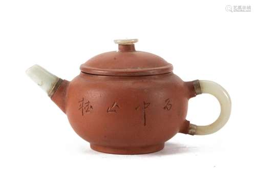 A CHINESE INSCRIBED YIXING-GLAZE TEAPOT