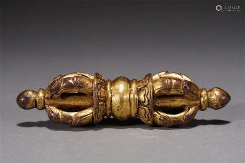 A TIBETAN BRONZE-GILT VAJRA