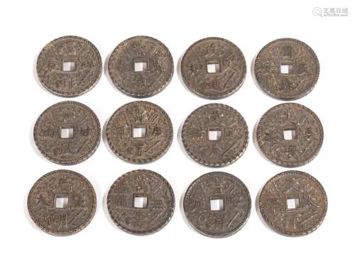 A GROUP OF TWELVE CHINESE SILVER COINS