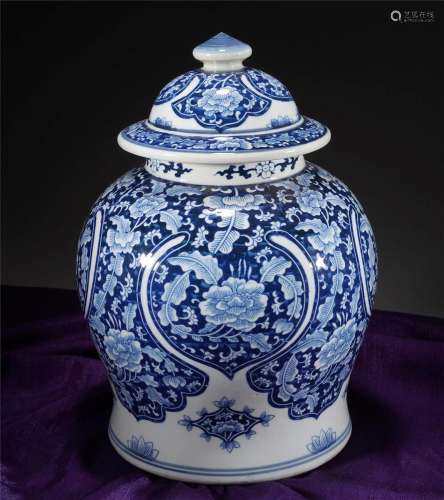 A CHINESE BLUE AND WHITE GARNITURE WITH COVER