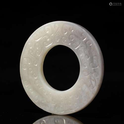 A CHINESE CARVED JADE CIRCULAR DISC BI