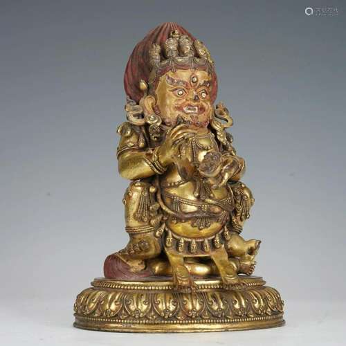 A TIBETAN BRONZE-GILT MAHAKALA