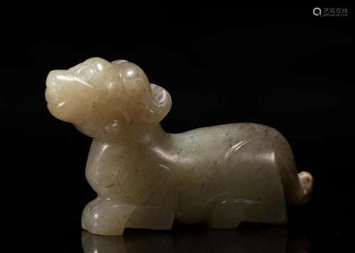 A CHINESE CARVED JADE MYTHICAL BEAST