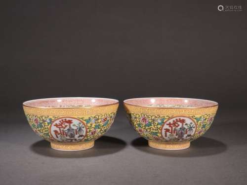 A pair of pastel melon bowls with yellow ground