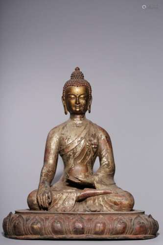 Clay and silver sitting statue of Sakyamuni