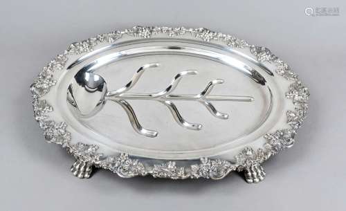 Large oval asparagus tray, 20th century, plated, on 4 paw fe...