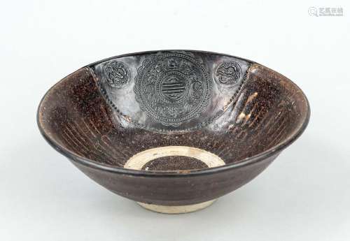 Rare brown glazed bowl with historic repair, China, Qing dyn...