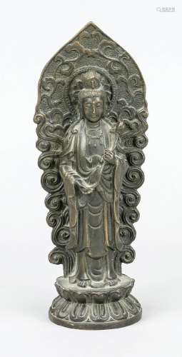 Merciful Guanyin with lotus, China, 19th/20th century, bronz...