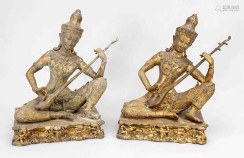 Pair of Gandharva lute players, Thailand, 20th c., brass, tw...