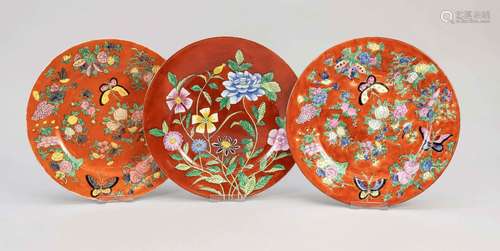 Three red Chinese plates, China, 20th c., porcelain with pol...