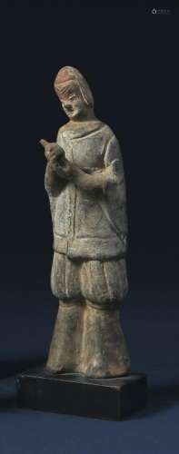 Statue de soldat en terre cuite grise polychrome. <br />
Le ...