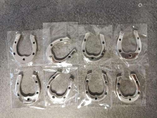 FIGURAL SILVER: 8 SMALL HORSESHOES