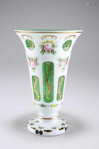 A BOHEMIAN EMERALD GREEN OVERLAY GLASS VASE, LATE 19TH CENTU...