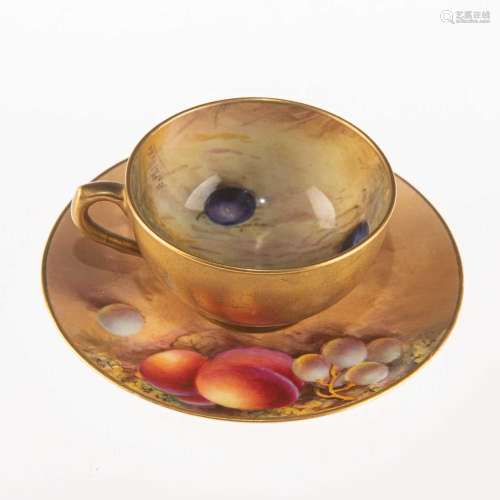 A ROYAL WORCESTER FRUIT PAINTED MINIATURE CUP AND SAUCER
