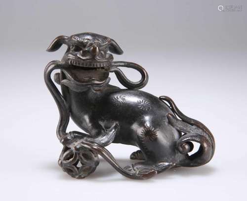 A CHINESE SMALL BRONZE BUDDHIST LION