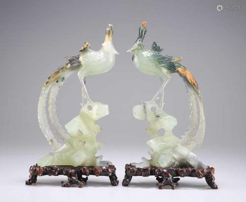 A PAIR OF 20TH CENTURY CHINESE CARVED SERPENTINE PHOENIXES