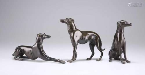 THREE BRONZE MODELS OF GREYHOUNDS