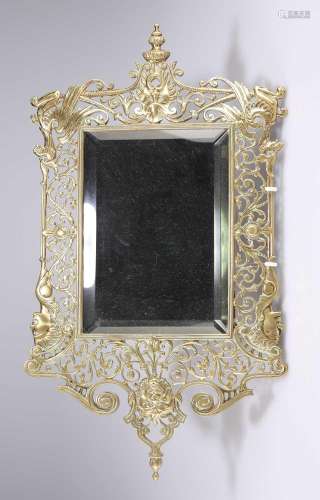 A VICTORIAN BRASS WALL MIRROR, BY WILLIAM TONKS & SONS, ...