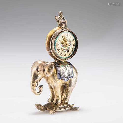 A RARE MINIATURE VIENNESE SILVER-GILT AND ENAMEL ELEPHANT CL...