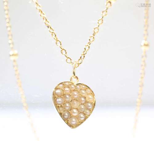 A SEED PEARL PENDANT ON CHAIN