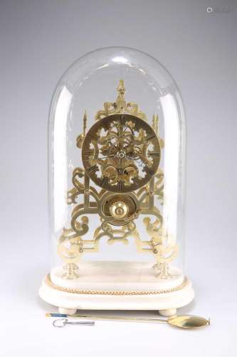 A BRASS SKELETON CLOCK