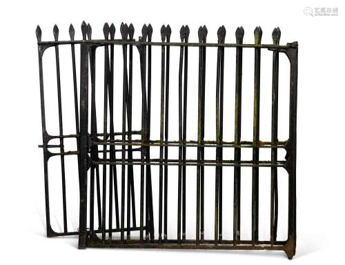 A LARGE PAIR OF CAST IRON GATES AND A SMALLER GATE EN SUITE