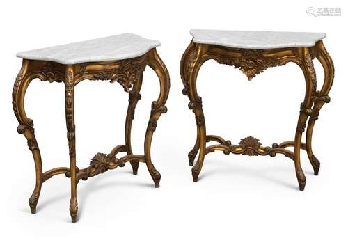 A PAIR OF LOUIS XV STYLE MARBLE-TOPPED GILTWOOD CONSOLE TABL...