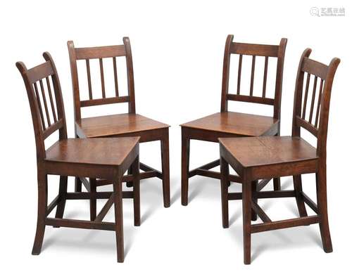 A SET OF FOUR EARLY 19TH CENTURY OAK DINING CHAIRS