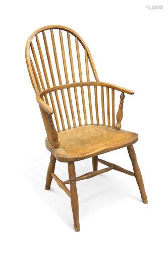 A 19TH CENTURY OAK AND ELM PRIMITIVE WINDSOR ARMCHAIR