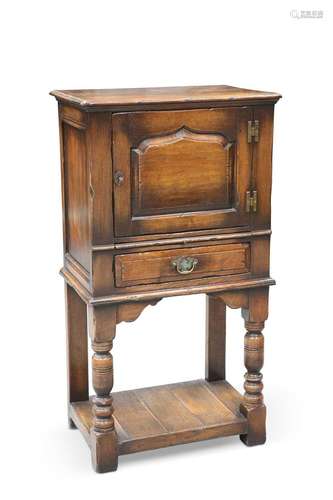 A CHAPMAN\'S SIESTA OAK CUPBOARD