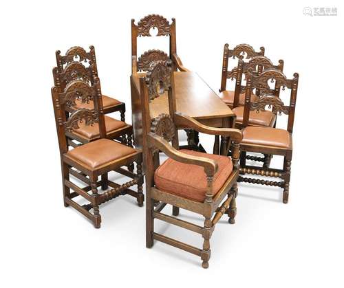 EIGHT OAK DINING CHAIRS AND AN OAK GATELEG DINING TABLE