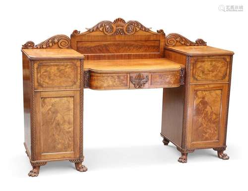 A REGENCY MAHOGANY BREAKFRONT SIDEBOARD, PROBABLY SCOTTISH