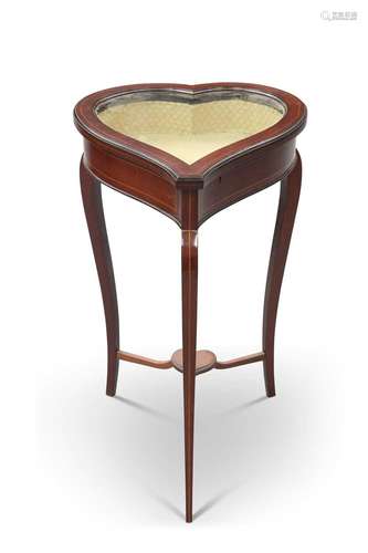 AN EDWARDIAN INLAID MAHOGANY HEART-SHAPED BIJOUTERIE TABLE