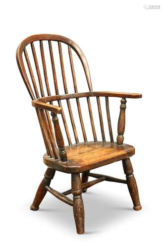 A 19TH CENTURY OAK AND BEECH PRIMITIVE WINDSOR CHILD\'S CHAI...