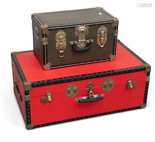 AN OVERPOND 20-INCH TRAVEL TRUNK, AND A LARGER RED TRAVEL TR...