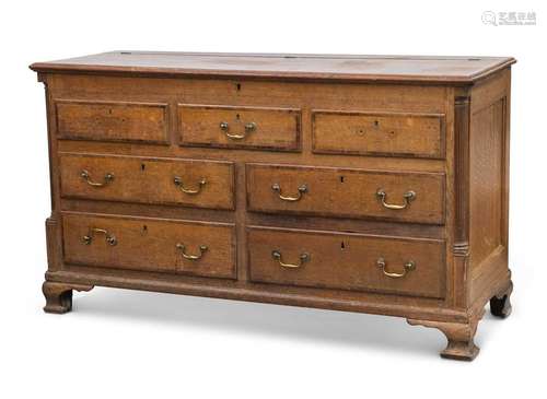 A GEORGE III LANCASHIRE OAK AND MAHOGANY BANDED MULE CHEST