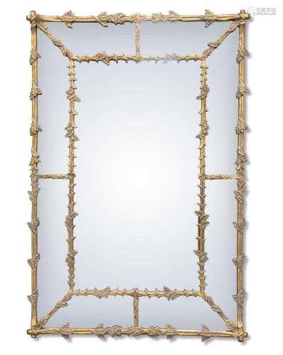 A LARGE PERIOD STYLE GILT-METAL AND COMPOSITION MIRROR
