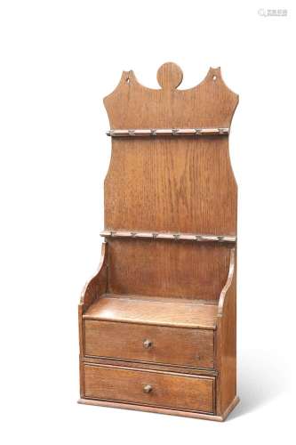 A GEORGE III OAK SPOON RACK, CIRCA 1800