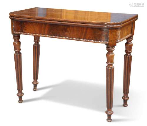 A MID-19TH CENTURY MAHOGANY FOLDOVER TEA TABLE