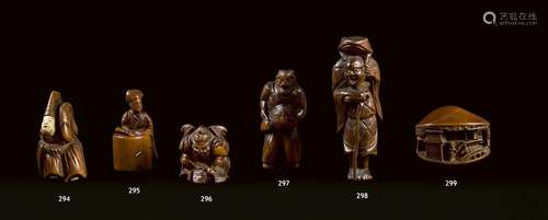 JAPON - Début du XIXe siècle<br />
Netsuke en bois et os, da...