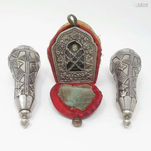 A pair of Eastern white coloured metal flasks, and a reliqua...