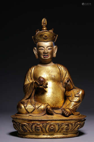 In the Qing Dynasty, the bronze gilded seated statue of the ...