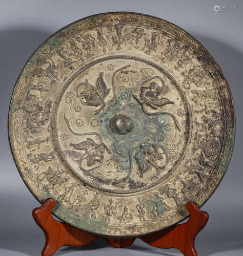 Before the Ming Dynasty, bronze mirrors were carved in relie...