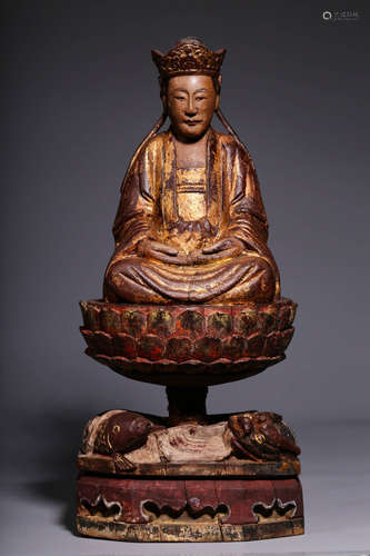 In the Qing Dynasty, a sitting statue of Guanyin with a wood...