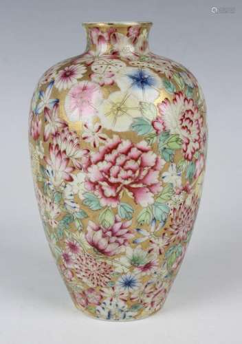 A Chinese famille rose millefleurs porcelain vase