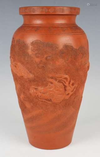 A Japanese red stoneware vase