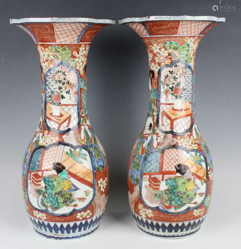 A pair of Japanese Imari porcelain vases by Hichozan Shinpo