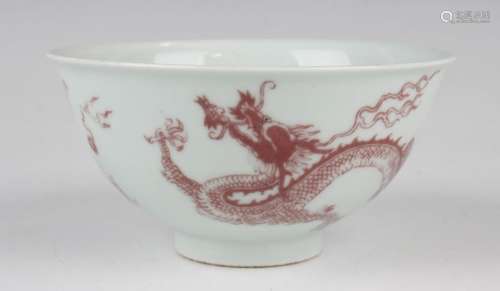 A Chinese underglaze red decorated porcelain bowl of steep-s...