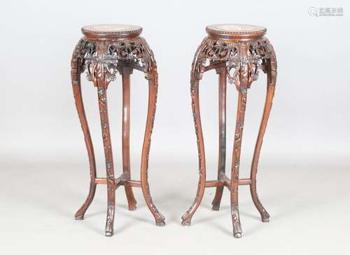 A pair of Chinese hardwood jardinière stands